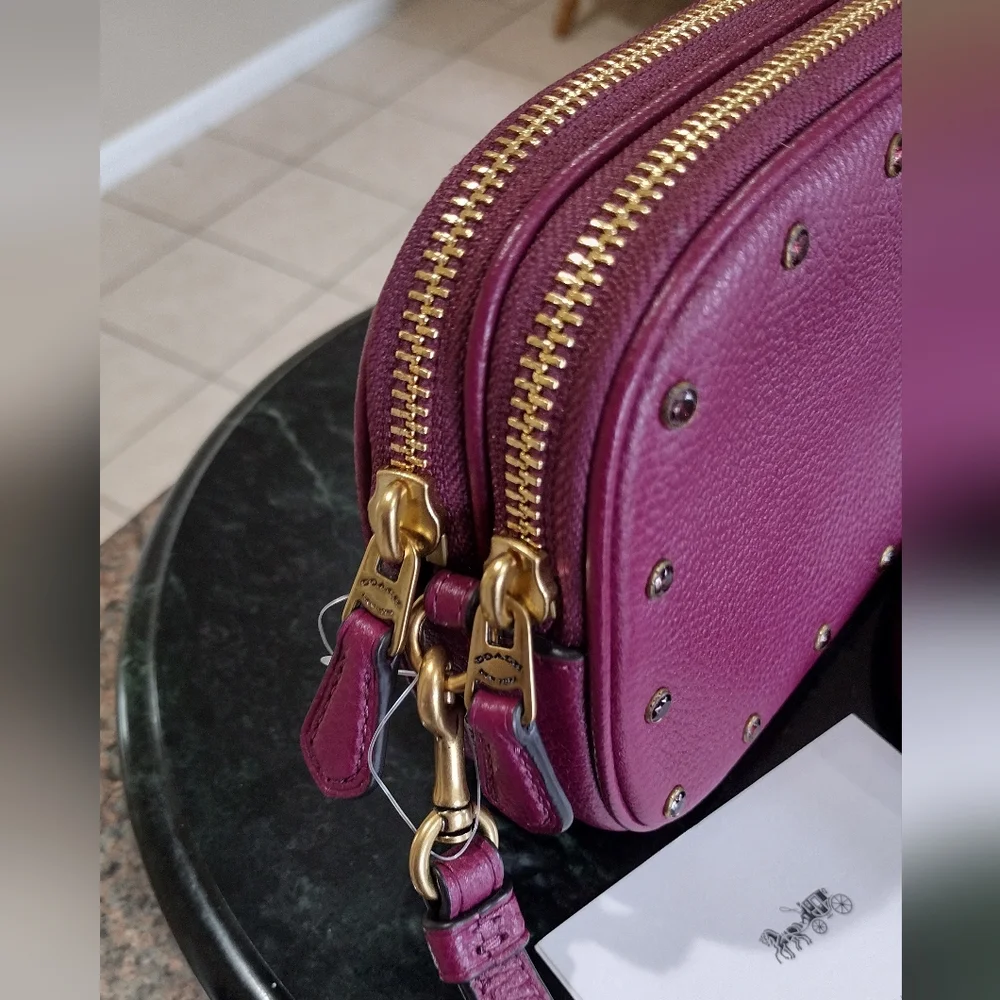 NWT Coach Cristal Border Rivets Dark Berry Crossbody / Clutch in Pebble …